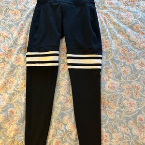 Bombshell Sportswear Black and White Leggings with Striped Design